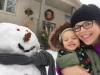Claire and Meg build a snowman